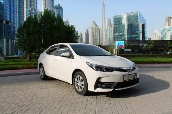 https://dev.quickdrive.ae/uploads/2021/02/12/toyota-corolla.jpg